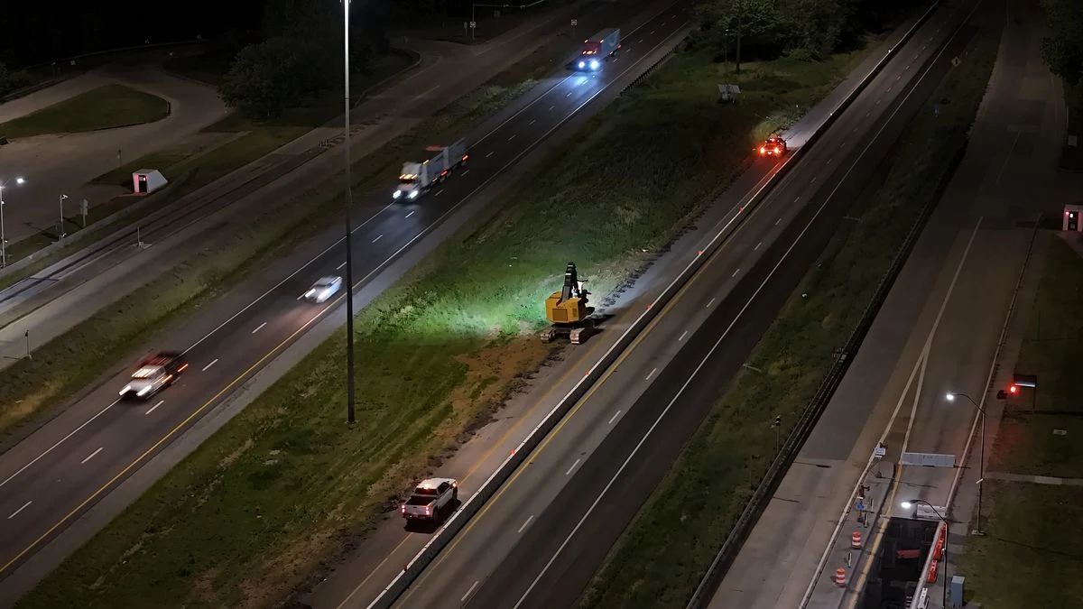 Nighttime equipment movements planned around the available work window.